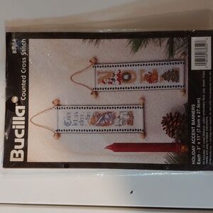 Bucilla Cross Stitch Kit with Festive Red and Green Banners